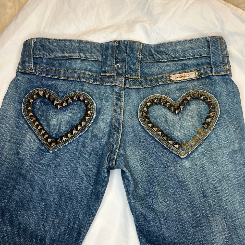 👖Frankie B Jeans. Low rise, flare bottom, studded heart shape pocket detail
